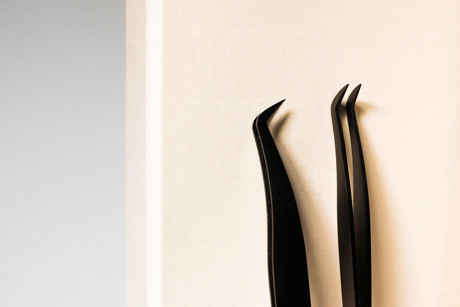 Classic and Russian Volume eyelash extension tweezer with a built-in ruler, showcasing precision tips and measurement markings for accurate lash application.