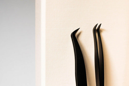 Classic and Russian Volume eyelash extension tweezer with a built-in ruler, showcasing precision tips and measurement markings for accurate lash application.