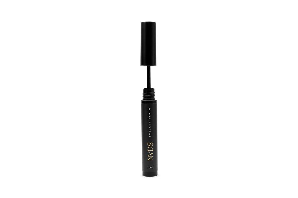 Bottle of NVDS Eyelash Growth Serum, formulated to enhance and stimulate natural lash growth, promoting fuller and longer lashes with regular use.