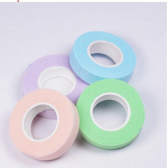 Sensitive tape for eyelash extensions, designed for delicate skin to secure lower lashes during application, providing gentle adhesion and reducing irritation.